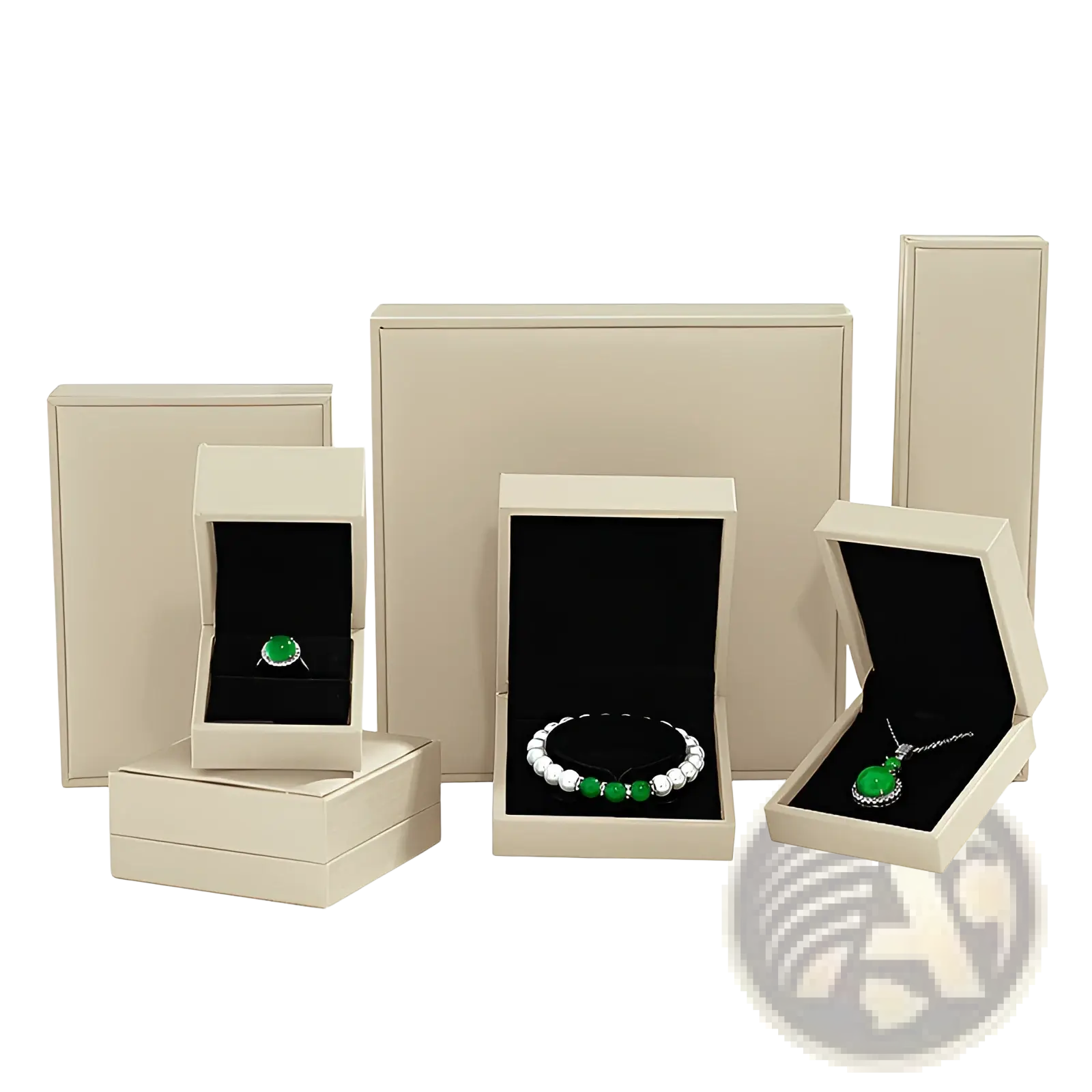 Beige luxury jewelry boxes with black velvet interiors displaying green gemstone sterling silver interlocking infinity heart pendant necklaces