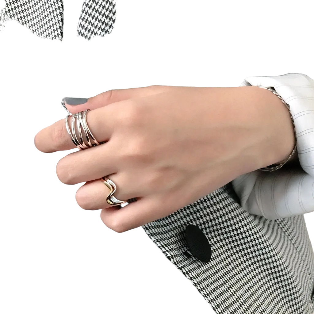 Sterling silver interwoven adjustable ring set featuring minimalist stackable smooth bands and an elegant wave ring design