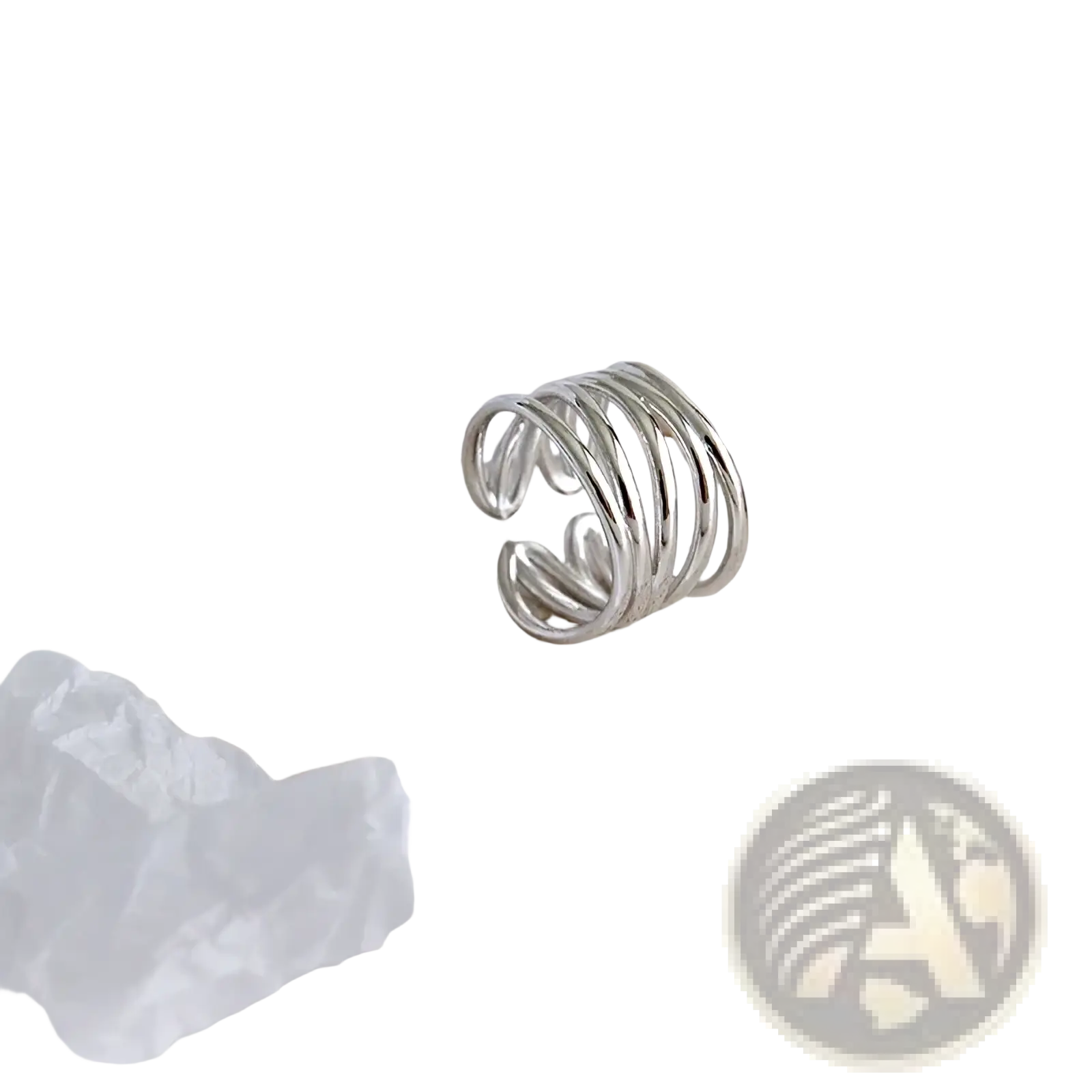 Sterling silver interwoven adjustable ring with a sleek coiled design in silver color