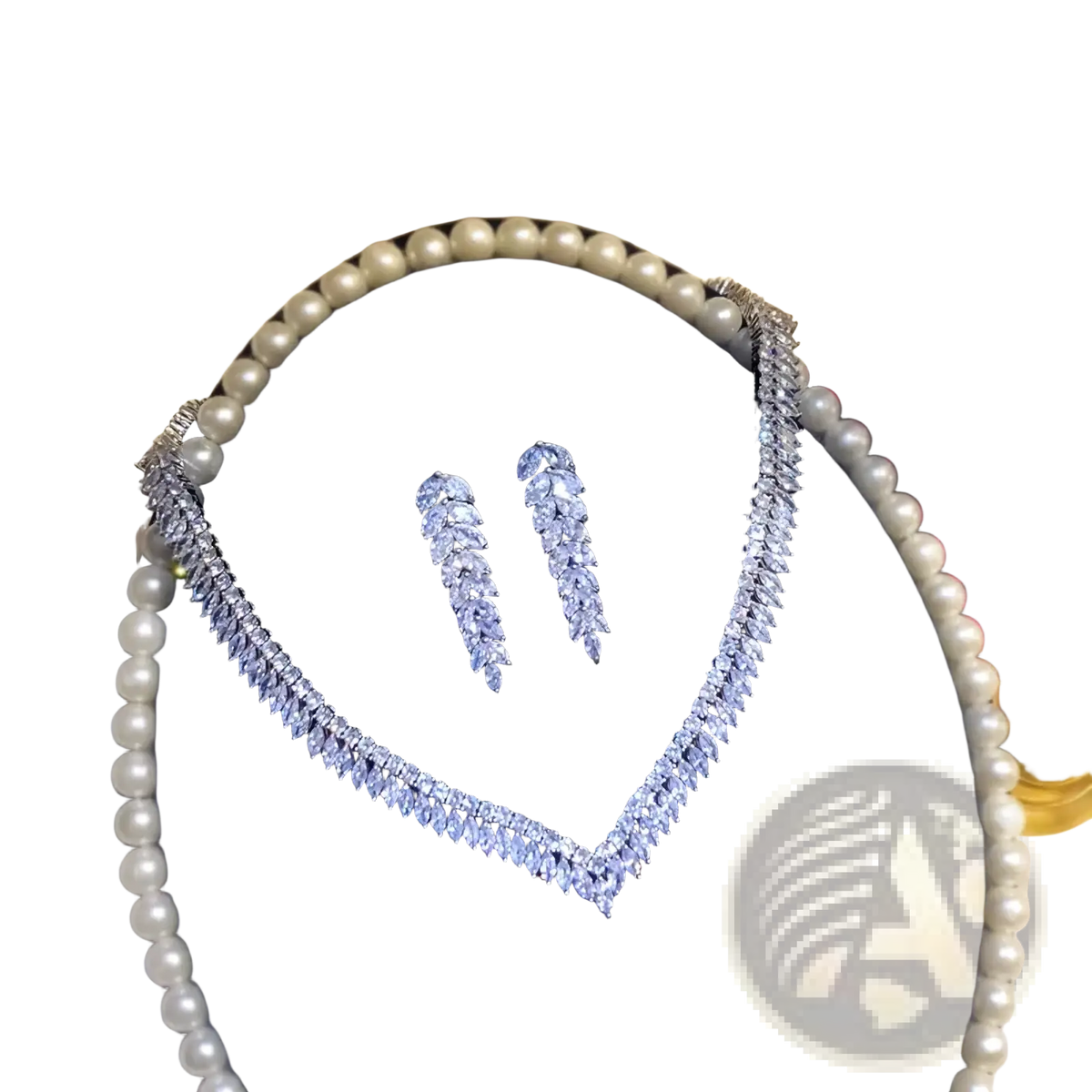 Sterling silver leaf bridal jewelry set featuring an elegant silver-toned diamond-studded v-shaped necklace with matching drop earrings