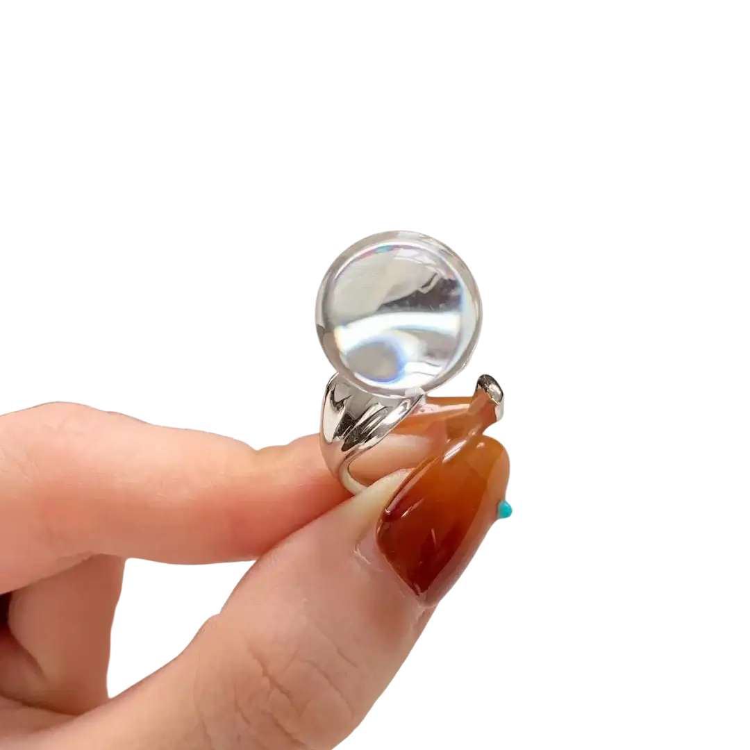 Sterling silver rings featuring a minimalist circular magnifying glass with amber resin base for women couple minimalist style