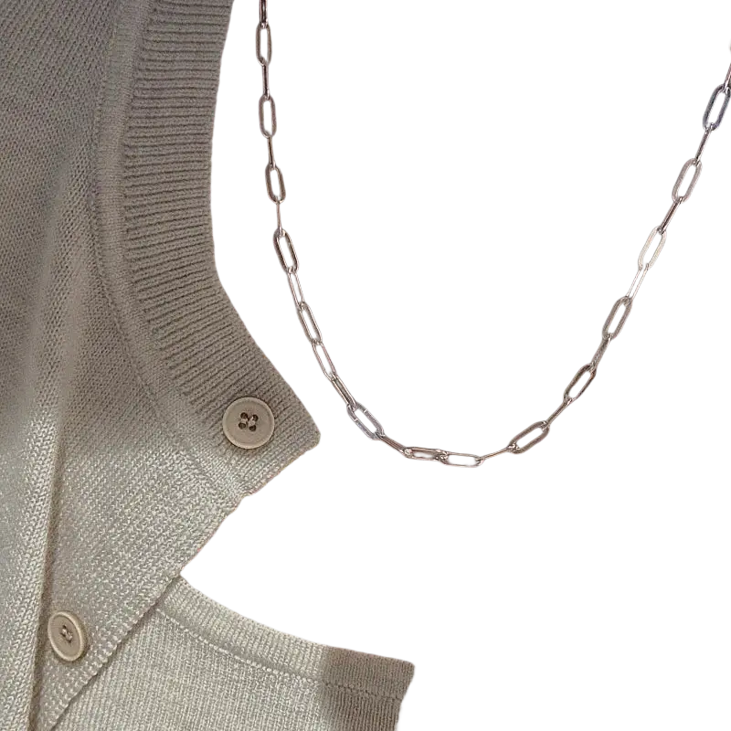A sterling silver minimalist paperclip chain necklace featuring a delicate silver chain with a sleek modern design