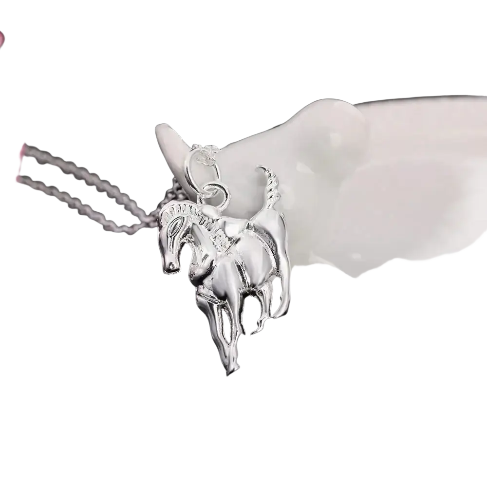 Sterling silver necklace featuring a silver horse pendant with intricate detailing and a delicate chain for women luxury wedding