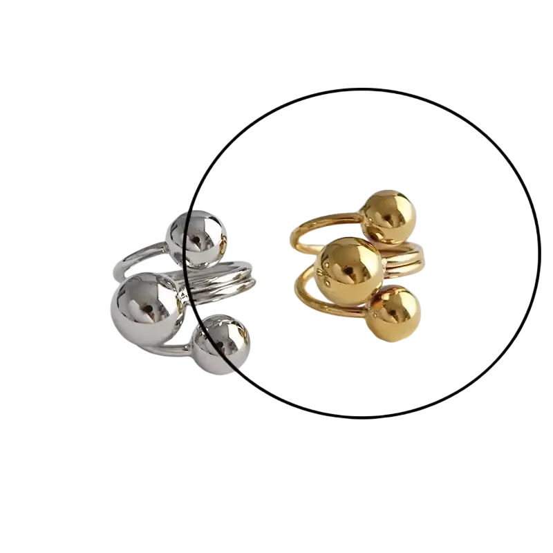 Sterling silver open ring for women featuring silver and gold polished spherical metallic bands