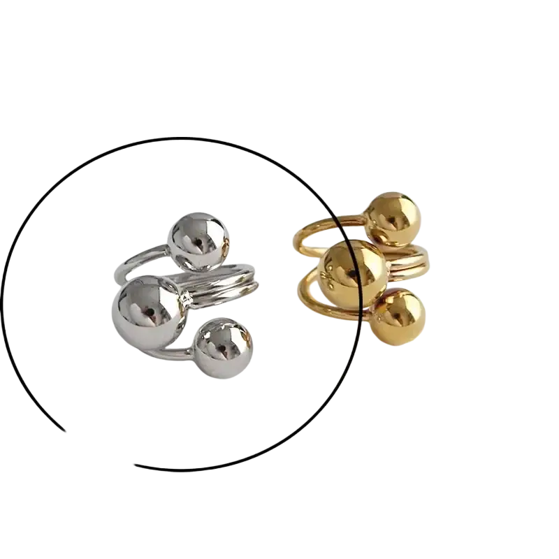 Sterling silver open ring for women featuring silver and gold polished spherical metallic bands