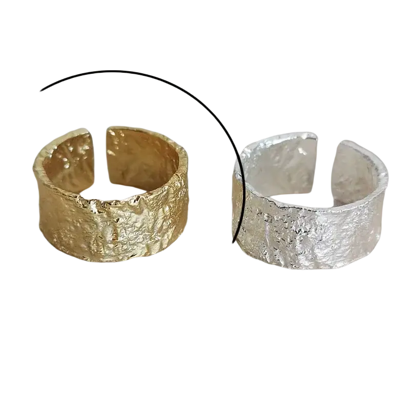 Sterling silver open ring for women featuring gold and silver adjustable bands with hammered rustic textured finish