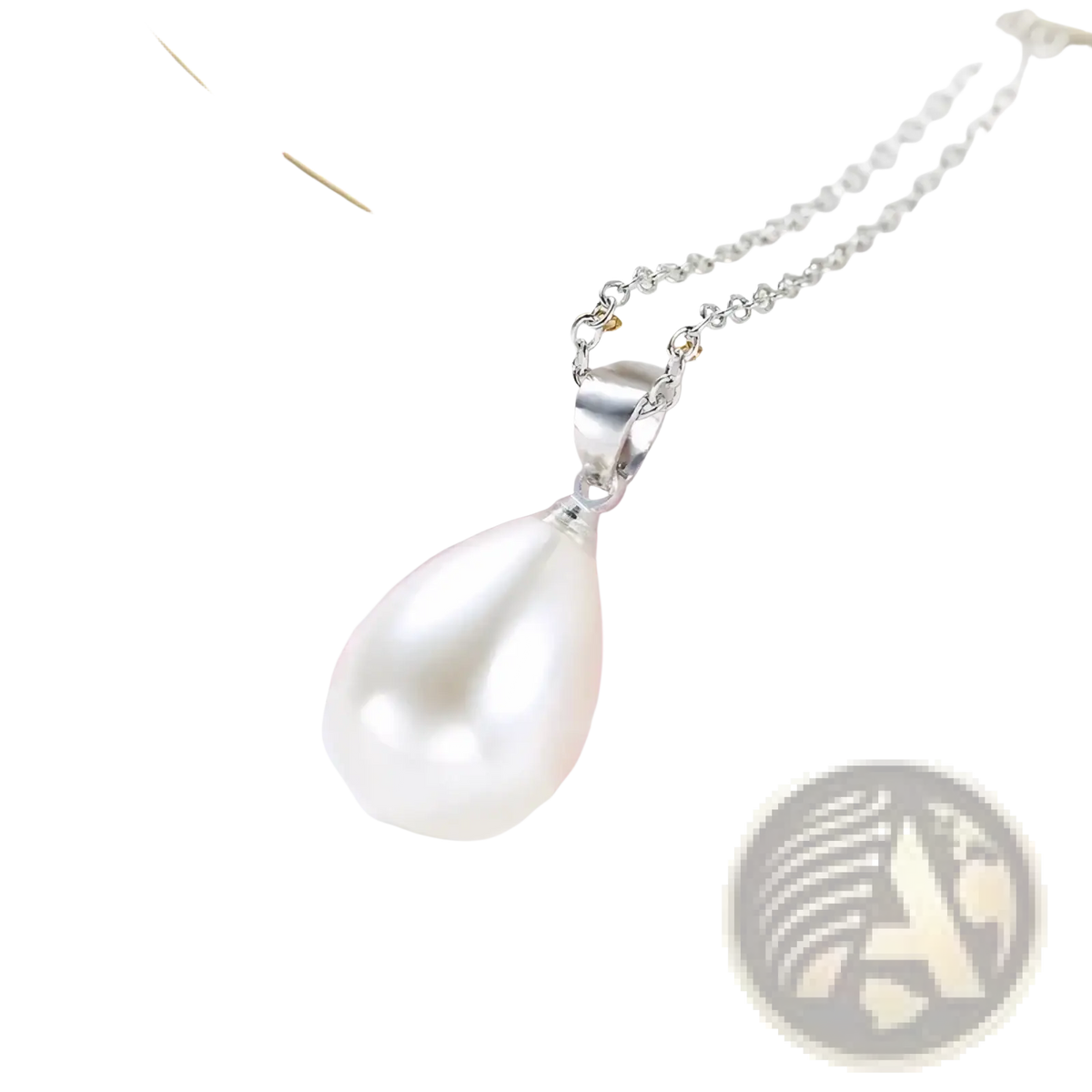 A sterling silver pearl jewelry set featuring a delicate pendant necklace with a teardrop-shaped white pearl