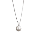 A lustrous white pearl pendant necklace for women with a delicate sterling silver chain and elegant design