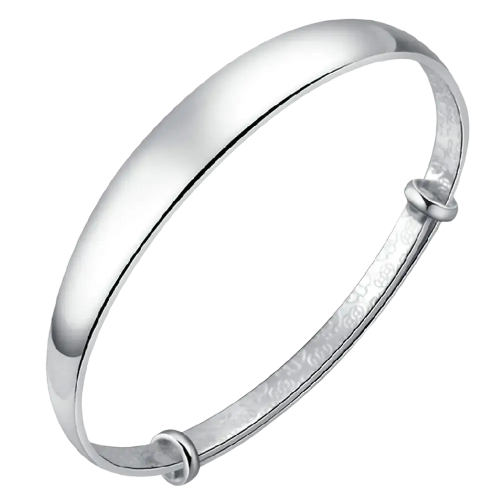 Sterling silver round bangle bracelet for women with sleek silver tone and intricately engraved inner band