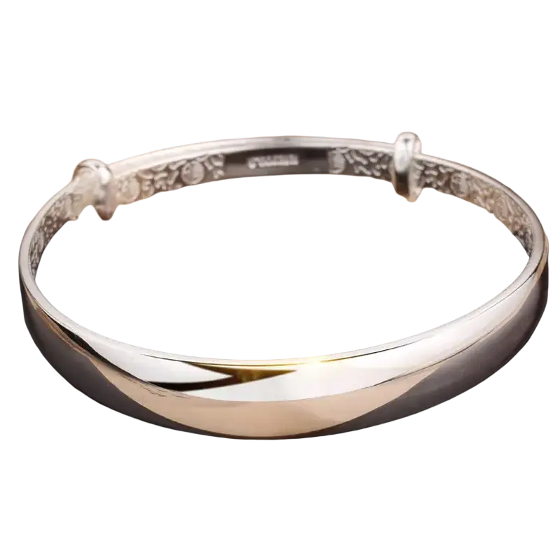 Sterling silver round bangle bracelet for women with smooth polished exterior and engraved floral inner edge