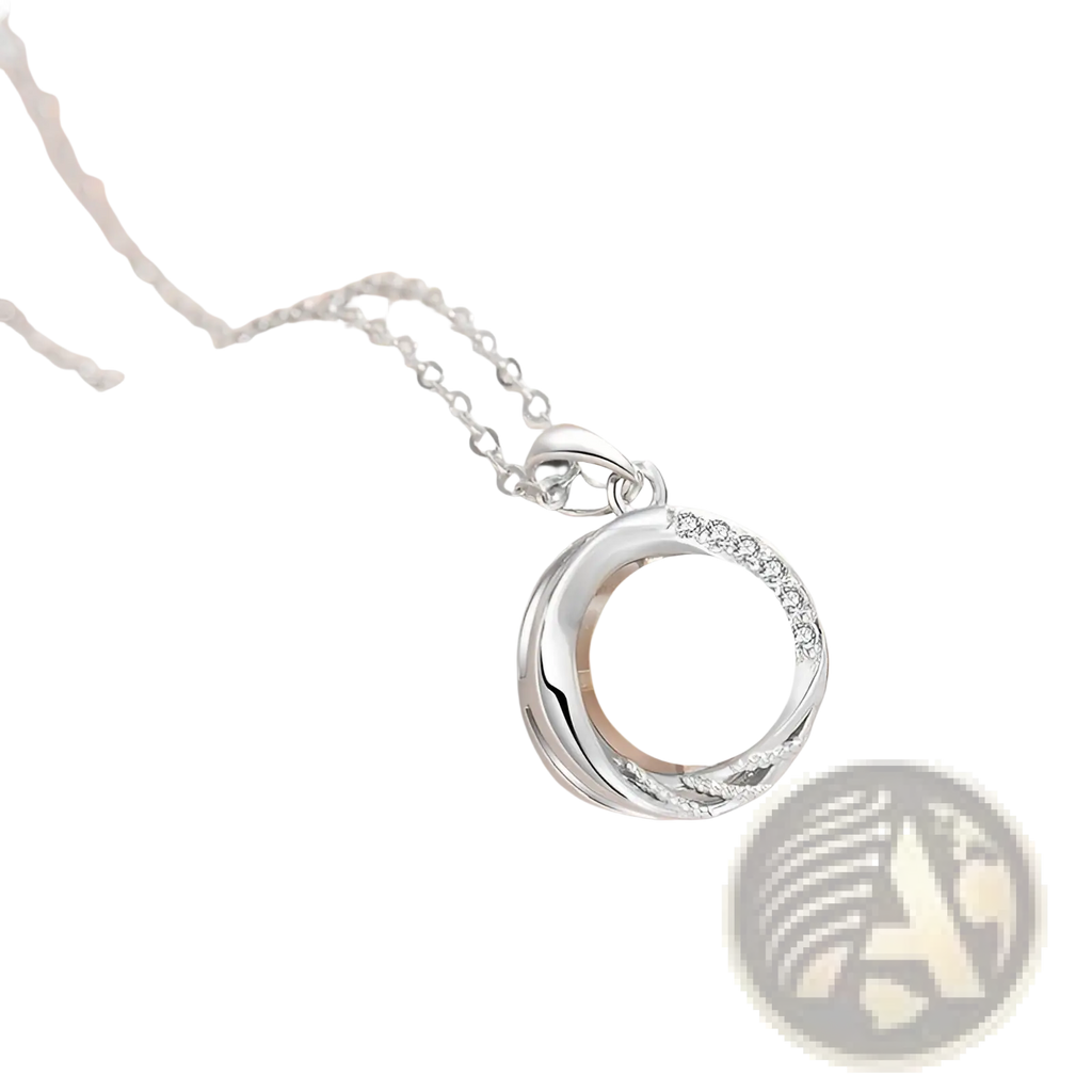 Sterling silver round freshwater pearl pendant necklace with a central white pearl and sparkling stone accents