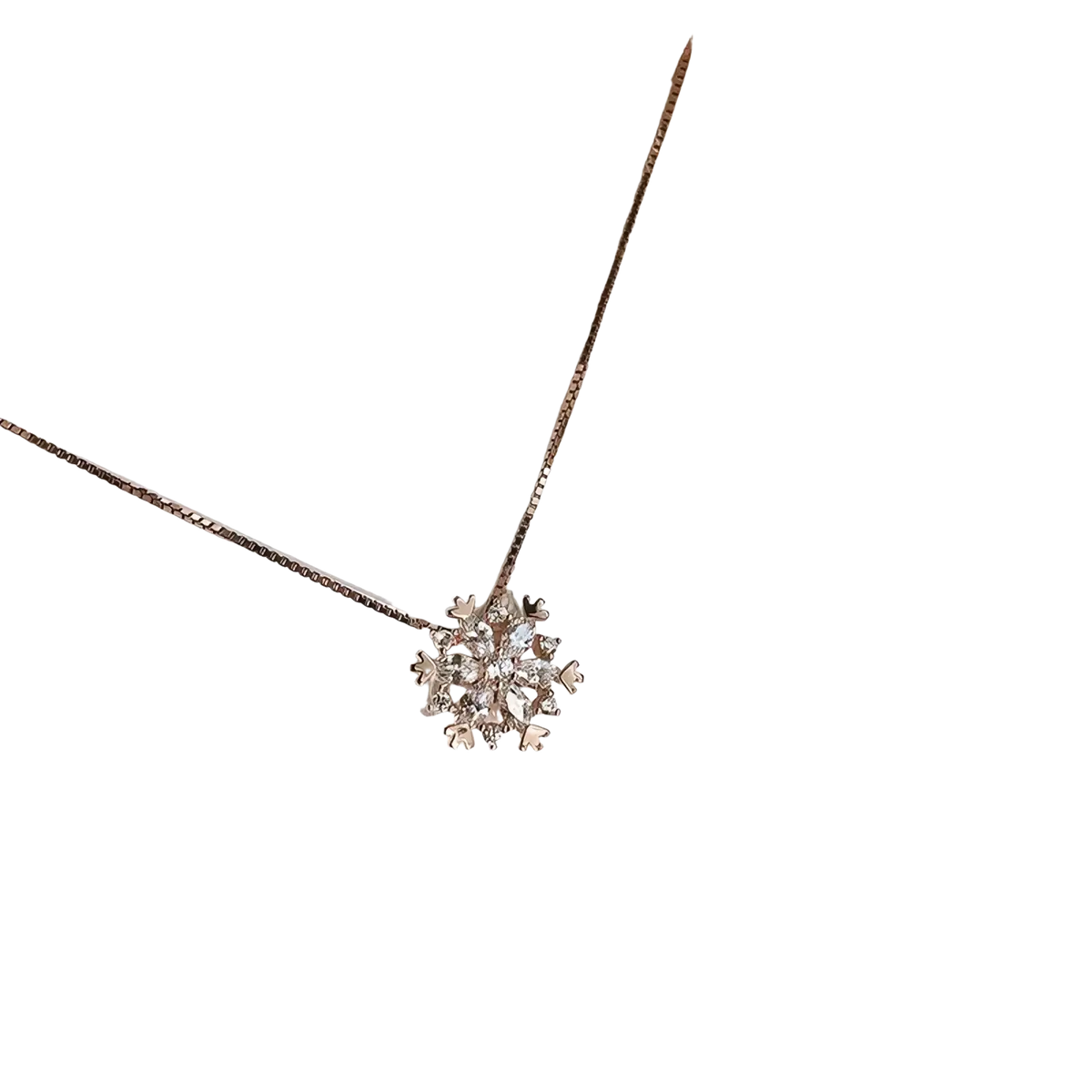 Sterling silver snowflake pendant necklace with delicate crystal accents displayed on a branded card