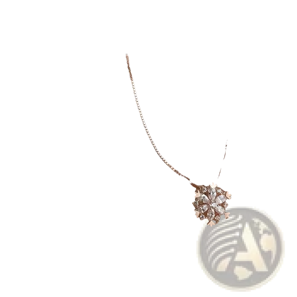 Sterling silver snowflake pendant necklace set featuring a delicate rose gold pendant with clear crystals on beige fabric