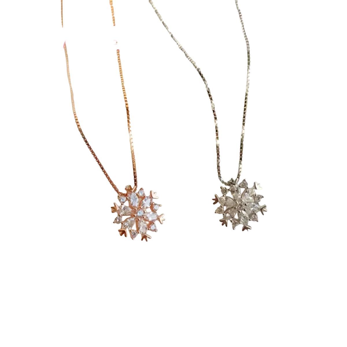 Two yameli sterling silver snowflake pendant necklaces in rose gold and silver with clear sparkling crystals