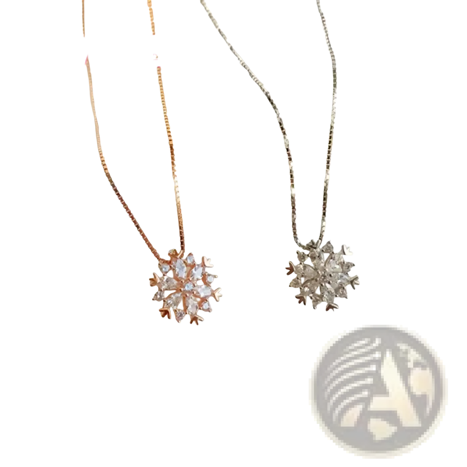 Two yameli sterling silver snowflake pendant necklaces in rose gold and silver with clear sparkling crystals