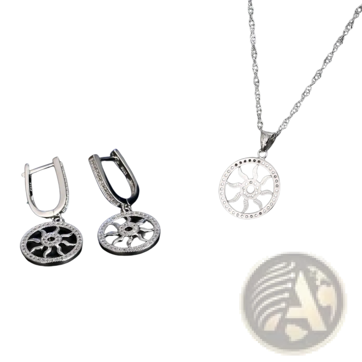 Sterling silver sunburst pendant necklace with a delicate chain and intricate circular design for elegant wear