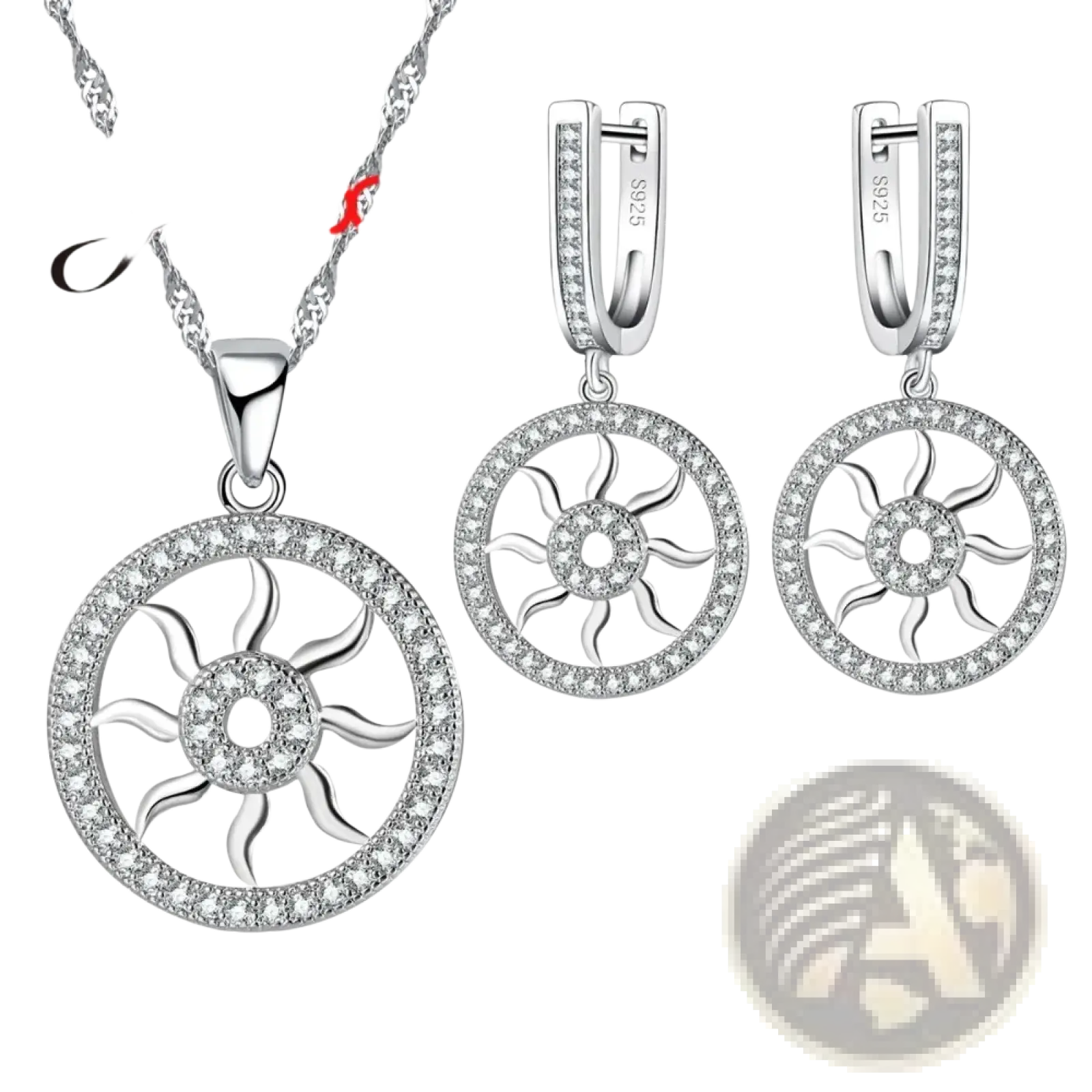 Sterling silver sunburst jewelry set featuring a pendant necklace and matching hoop earrings with clear stones