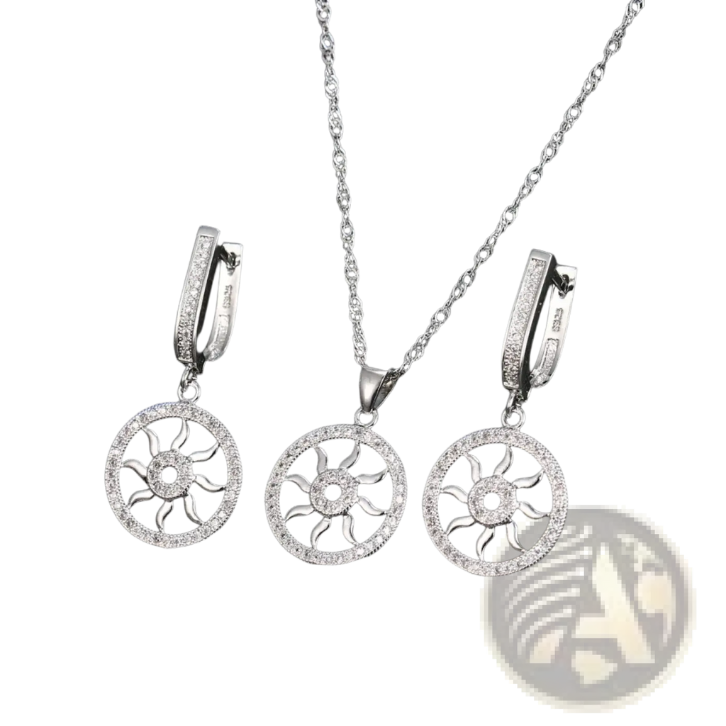 Sterling silver sunburst pendant necklace and matching hoop earrings set with pave-set cubic zirconia stones
