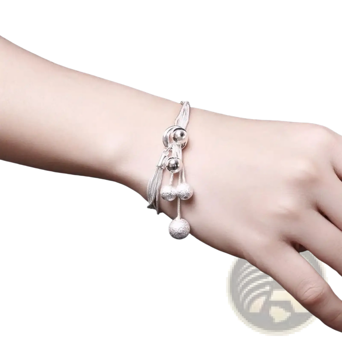 Sterling silver tassel bead jewelry set featuring a silver beaded bracelet with dangling spheres and tassels