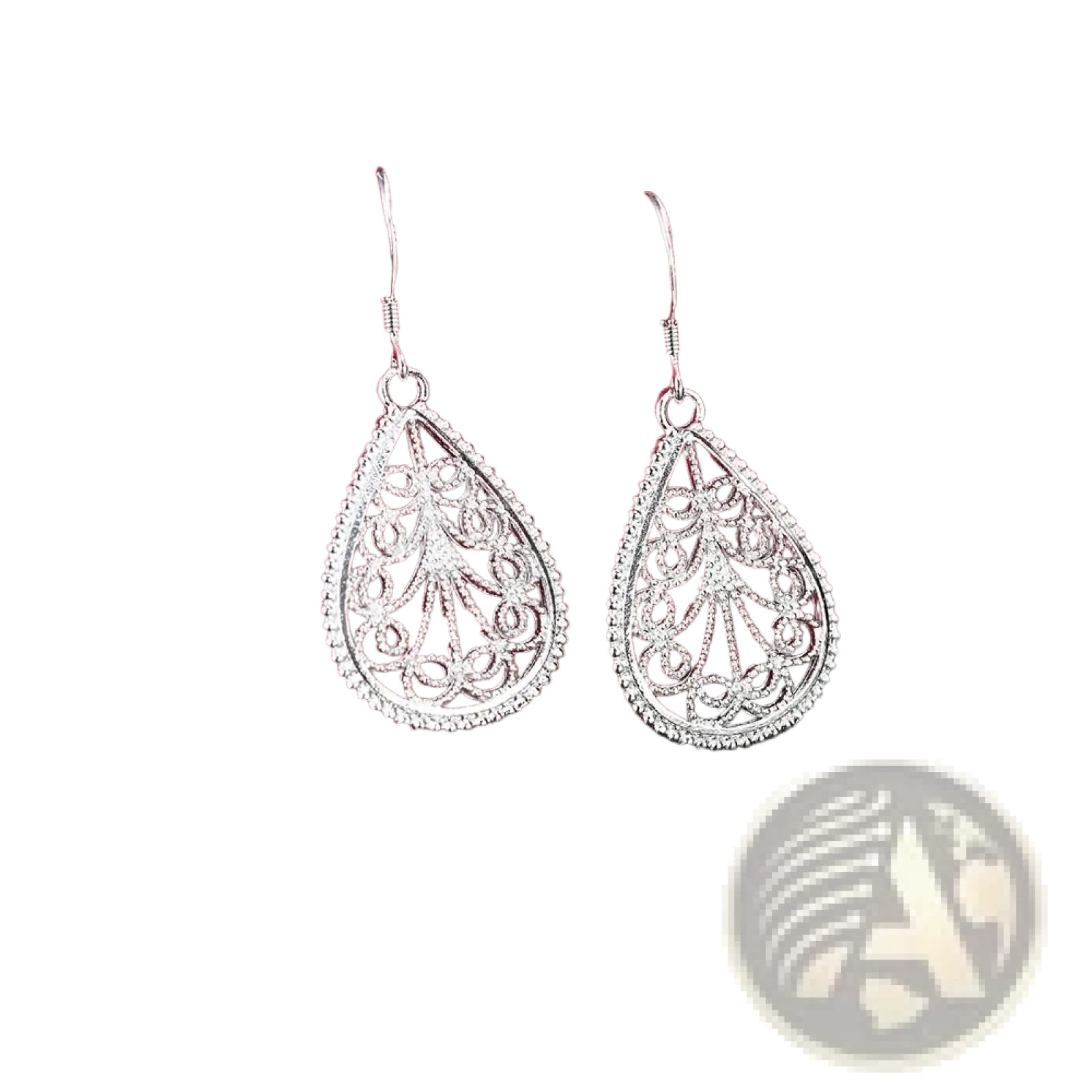 Sterling silver teardrop earrings featuring intricate filigree detailing and a beaded edge in a jewelry set