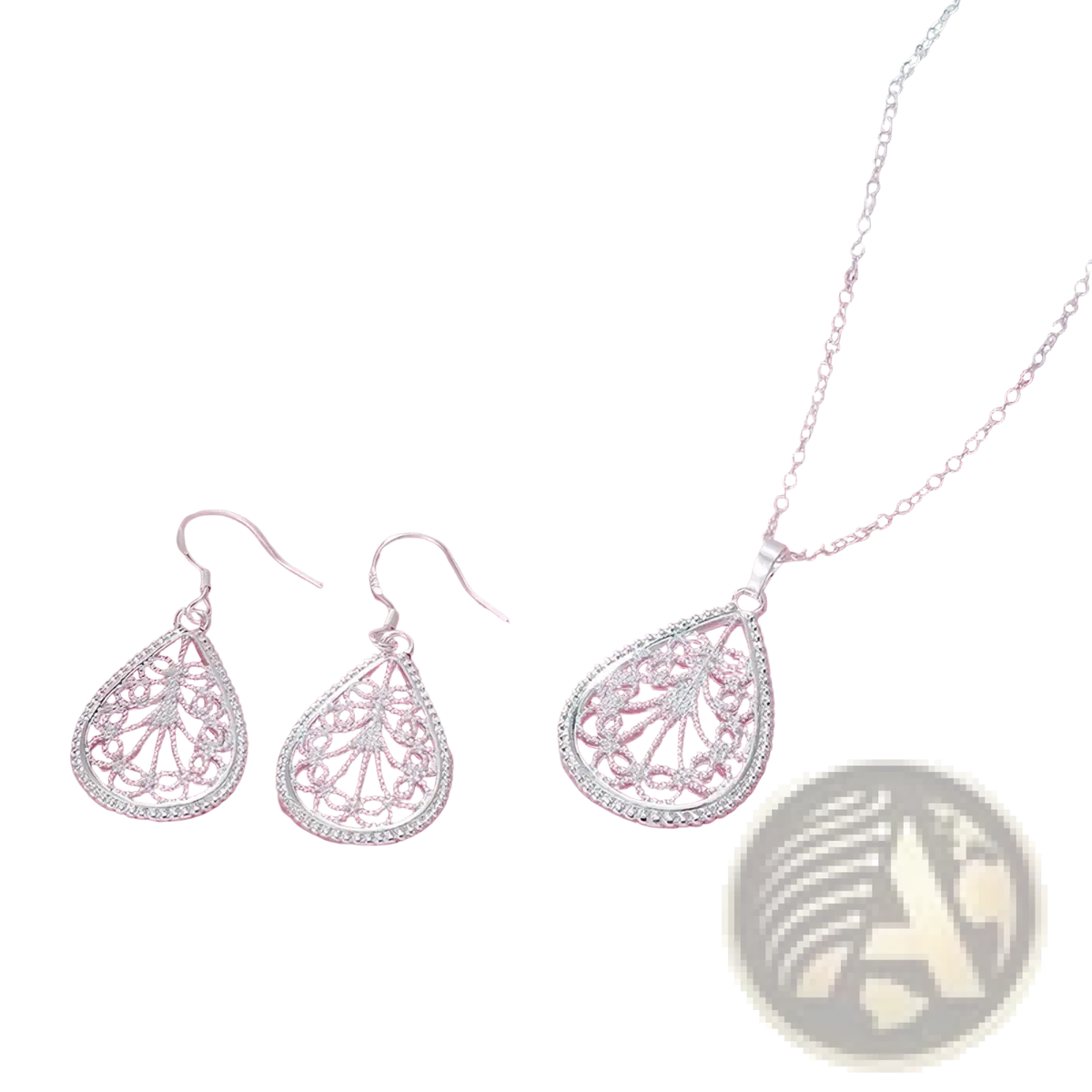 Sterling silver teardrop jewelry set featuring silver filigree pendant necklace and matching earrings