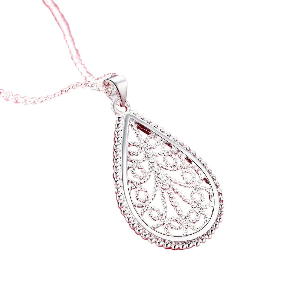 Sterling silver teardrop pendant necklace with intricate filigree design and beaded edge from jewelry set