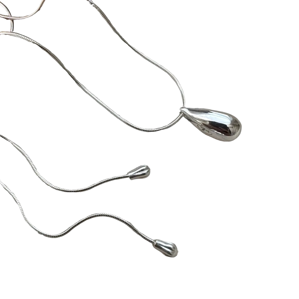 Sterling silver teardrop necklace with smooth polished finish and delicate snake chain fine jewelry accessory