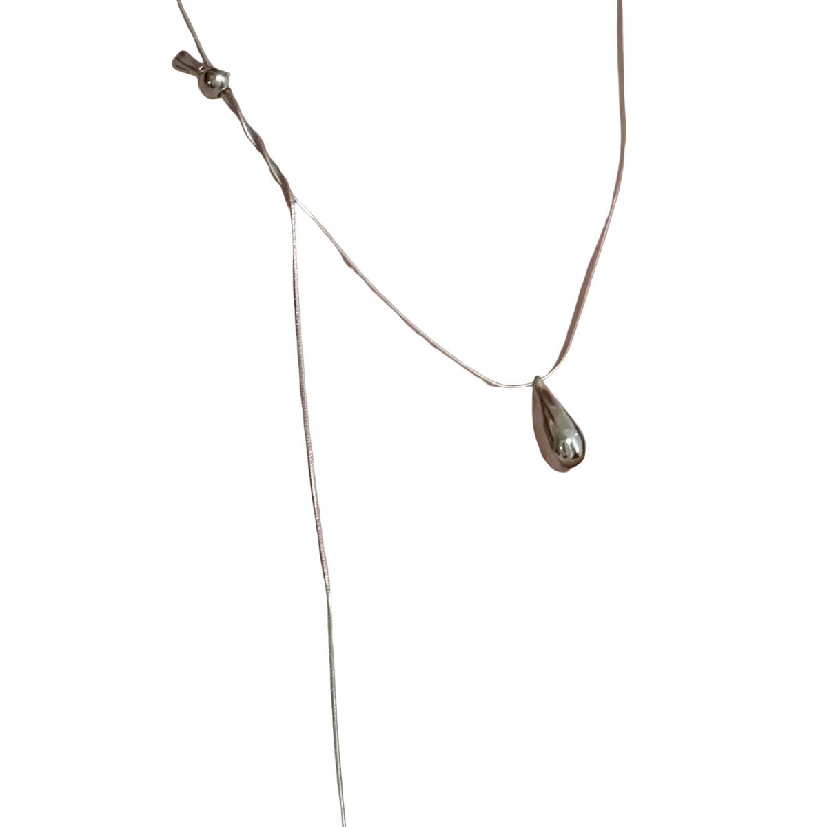 A sleek silver sterling silver teardrop necklace with a minimalist design and delicate chain for fine jewelry