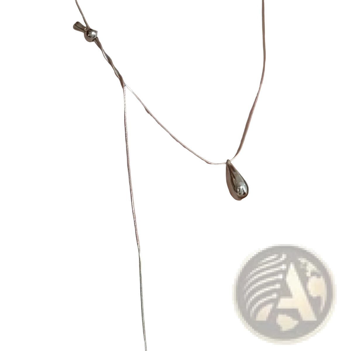 A sleek silver sterling silver teardrop necklace with a minimalist design and delicate chain for fine jewelry