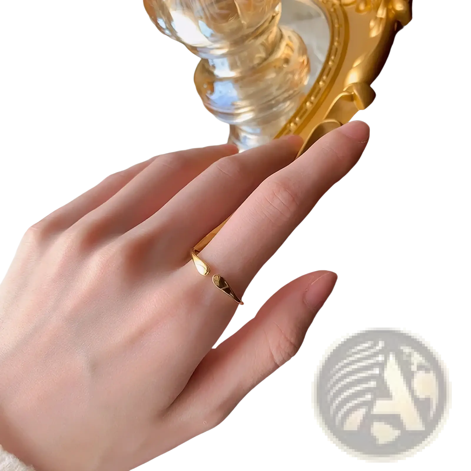 Sterling silver teardrop stackable ring with a delicate gold band featuring two small contrasting stones white and dark