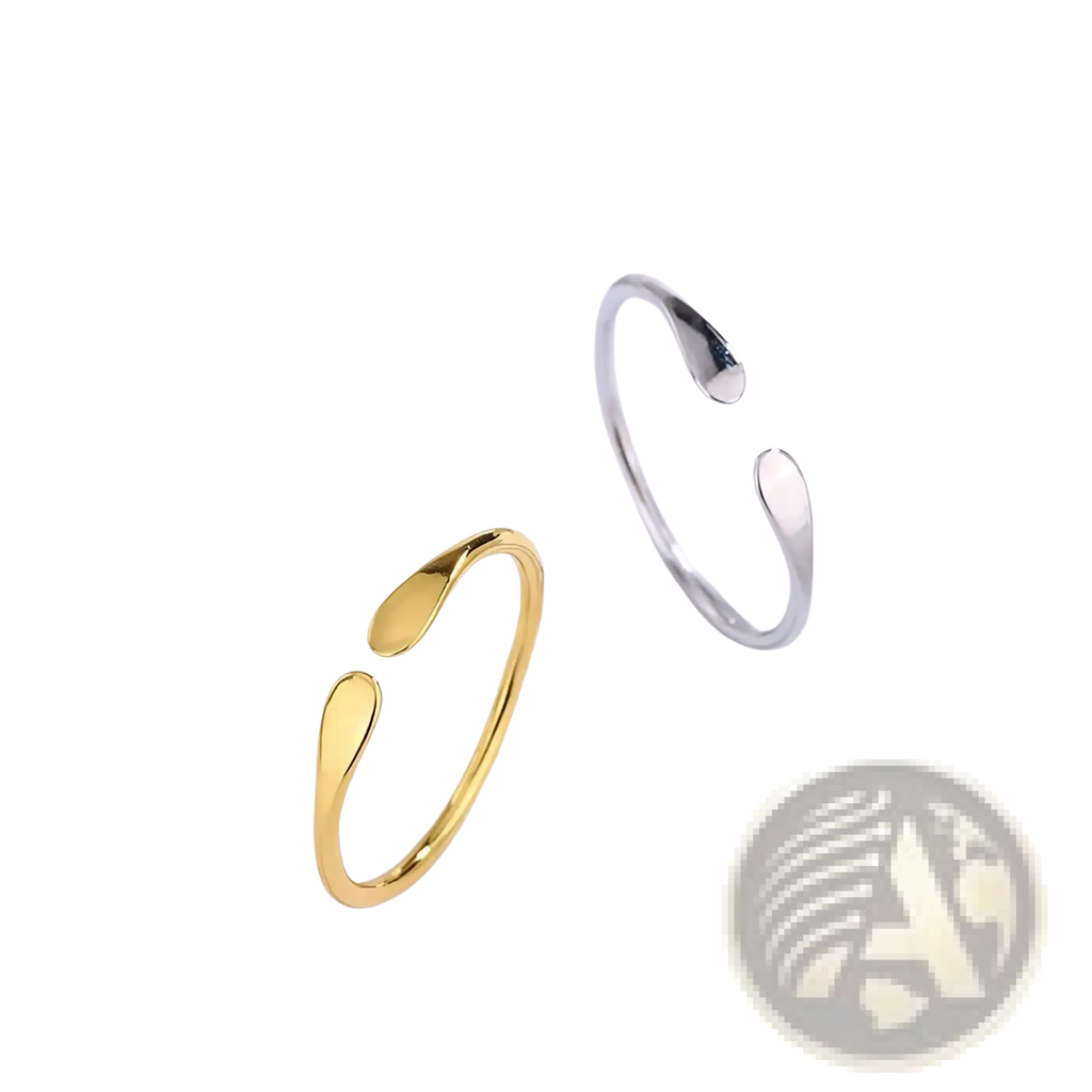 Two minimalist open-ended stackable rings in sterling silver and gold with teardrop-shaped polished metal design