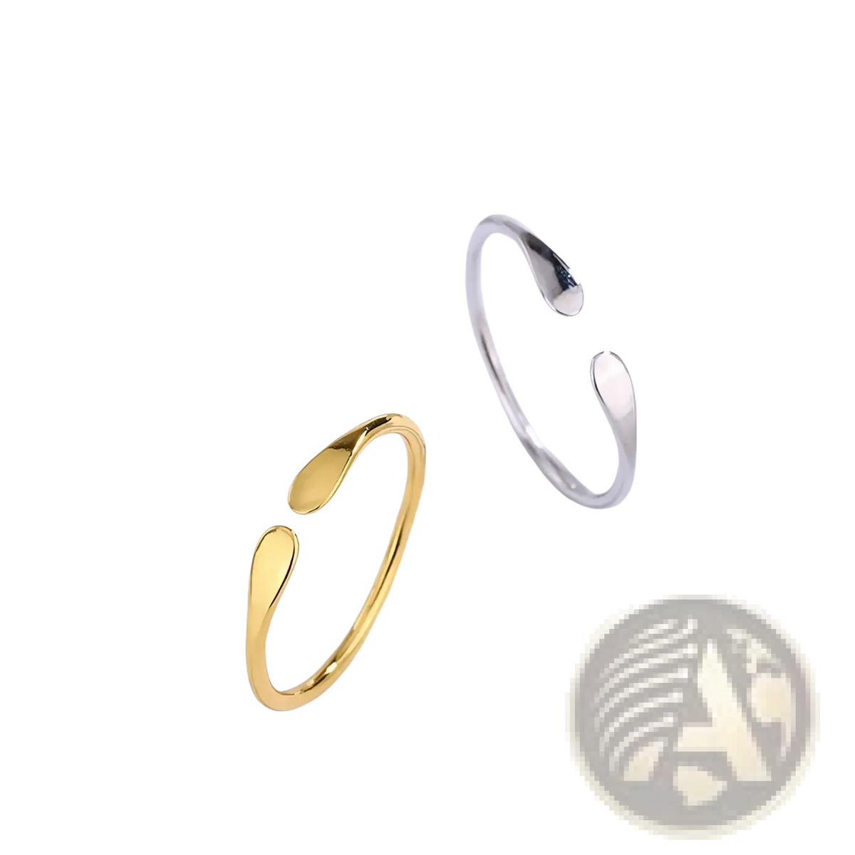 Two minimalist open-ended stackable rings in sterling silver and gold with teardrop-shaped polished metal design