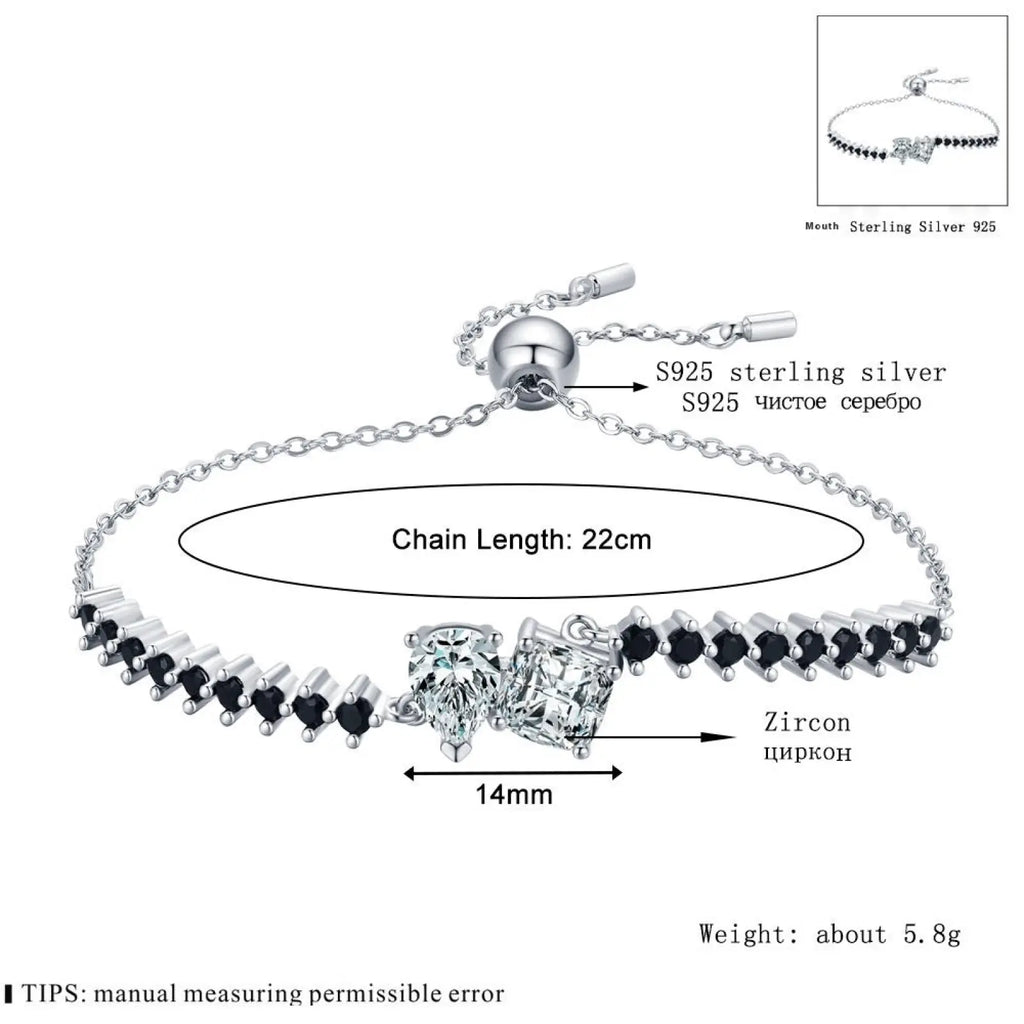 Sterling silver zircon heart pendant and bracelet set featuring clear and black zircon stones with adjustable chain clasp