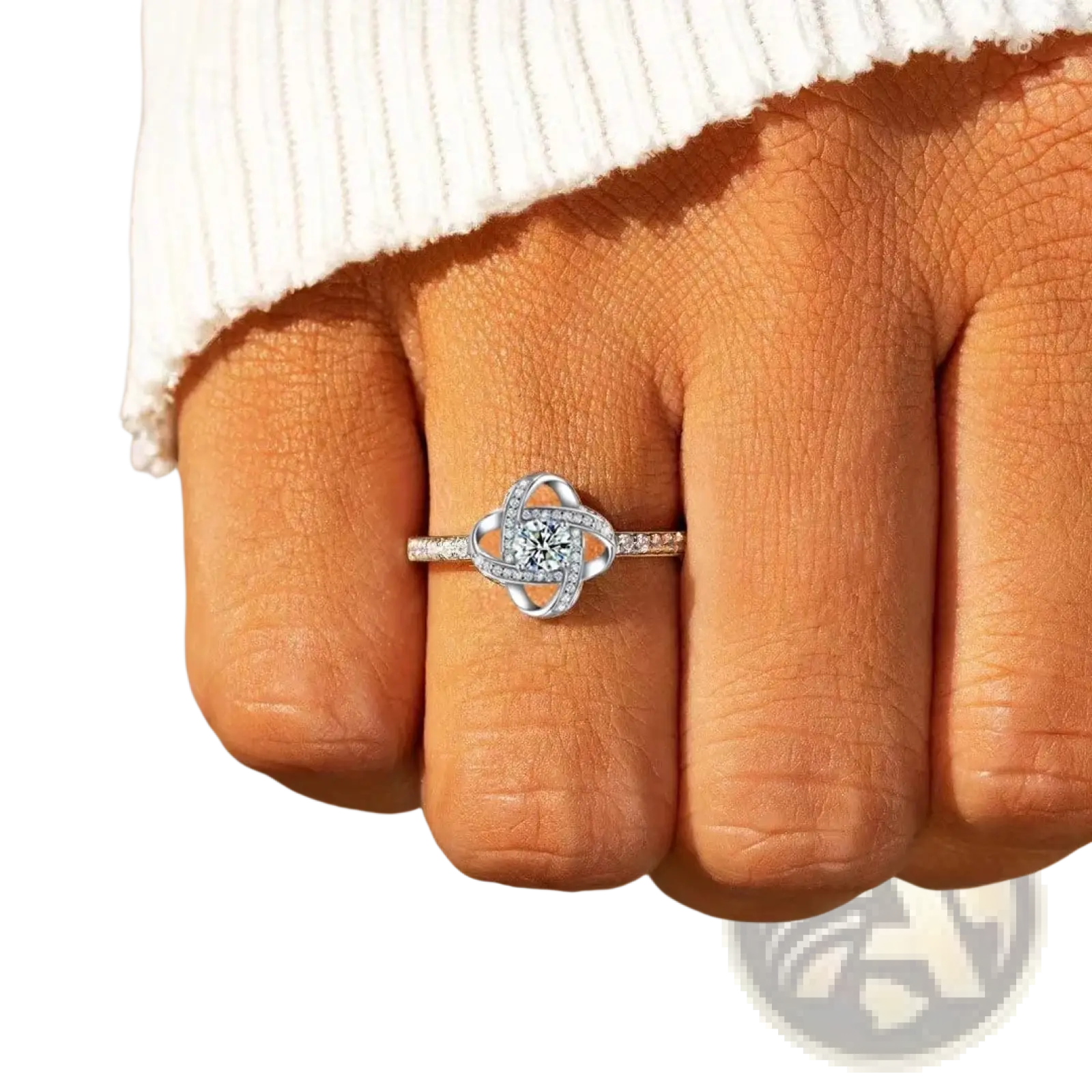 Sterling silver zircon knot ring featuring a central round diamond surrounded by smaller diamonds in an intricate design