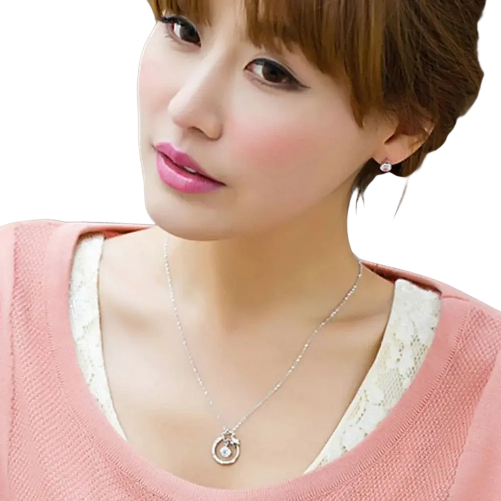 Sterling silver zircon pendant necklace for women with a delicate circular pendant featuring a clear gemstone and intricate metalwork