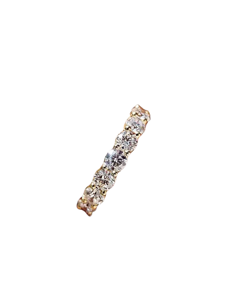 Sterling silver zircon wedding band for women with five round-cut clear stones in a continuous line design