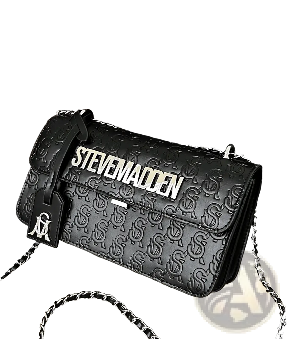 Black steve madden quilted crossbody bag with embossed logo pattern and silver chain strap for stylish use