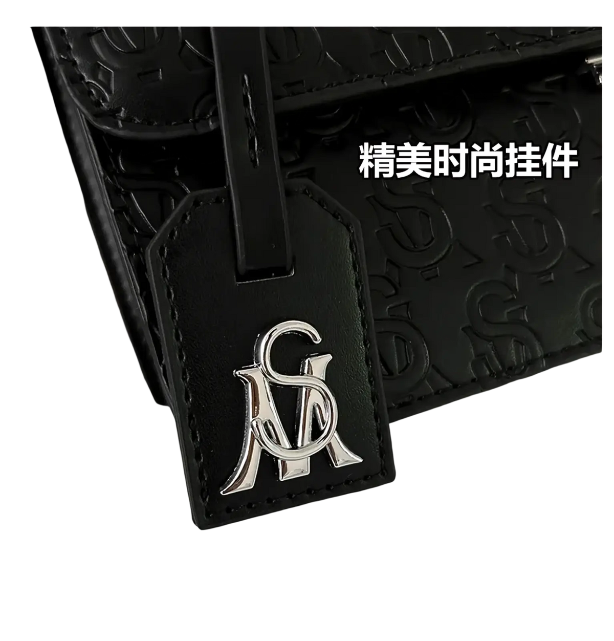Black leather tag with silver monogrammed logo on the Steve Madden quilted crossbody bag