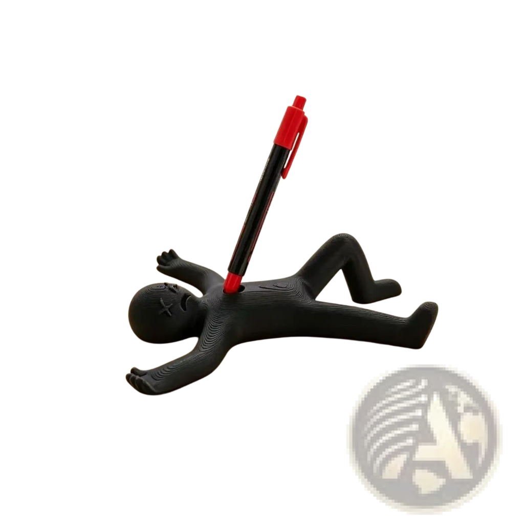 Black plastic stick figure pen holder desk organizer shaped like a sleeping person holding a red and black pen