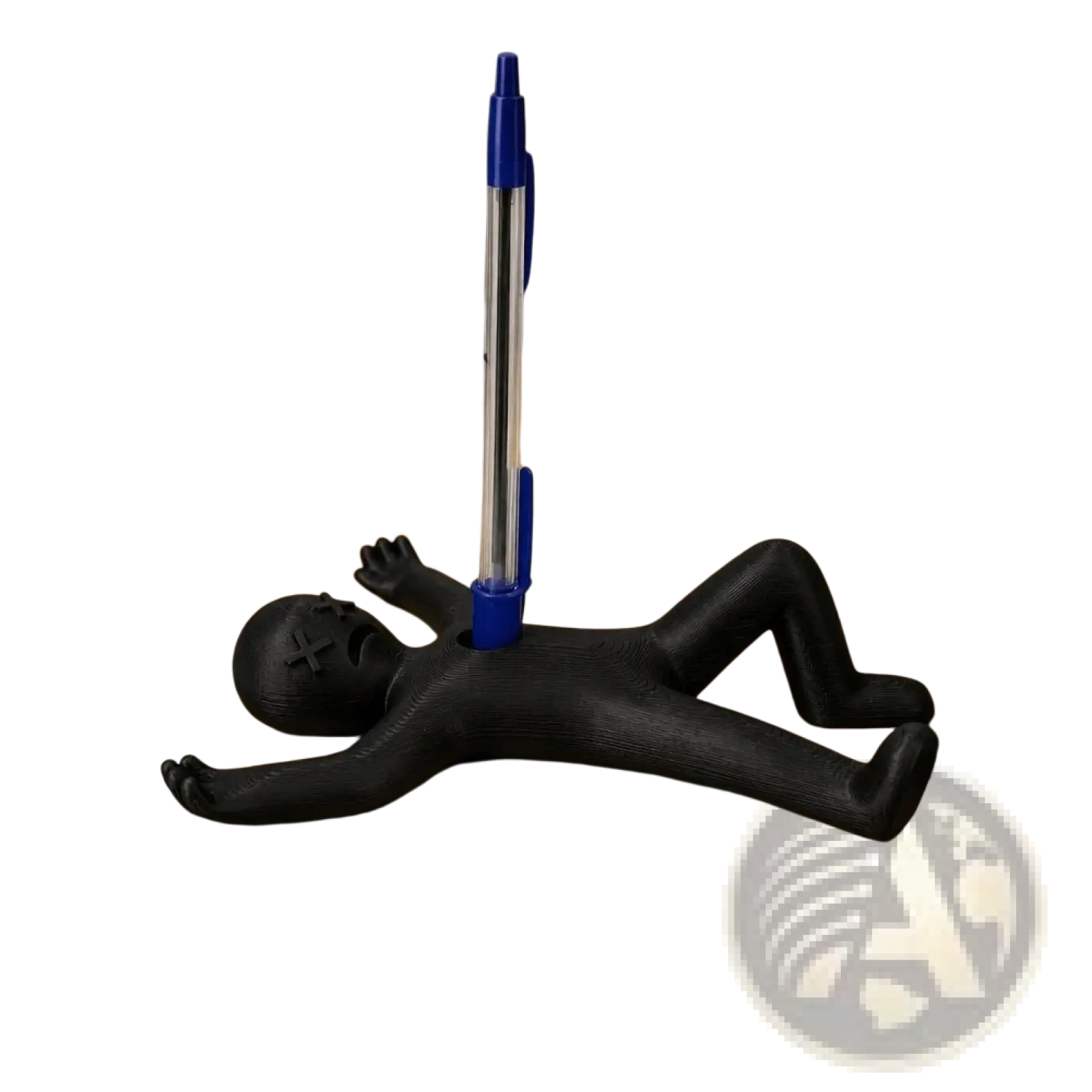 Black plastic stick figure pen holder desk organizer shaped like a sleeping figure holding a blue ballpoint pen upright