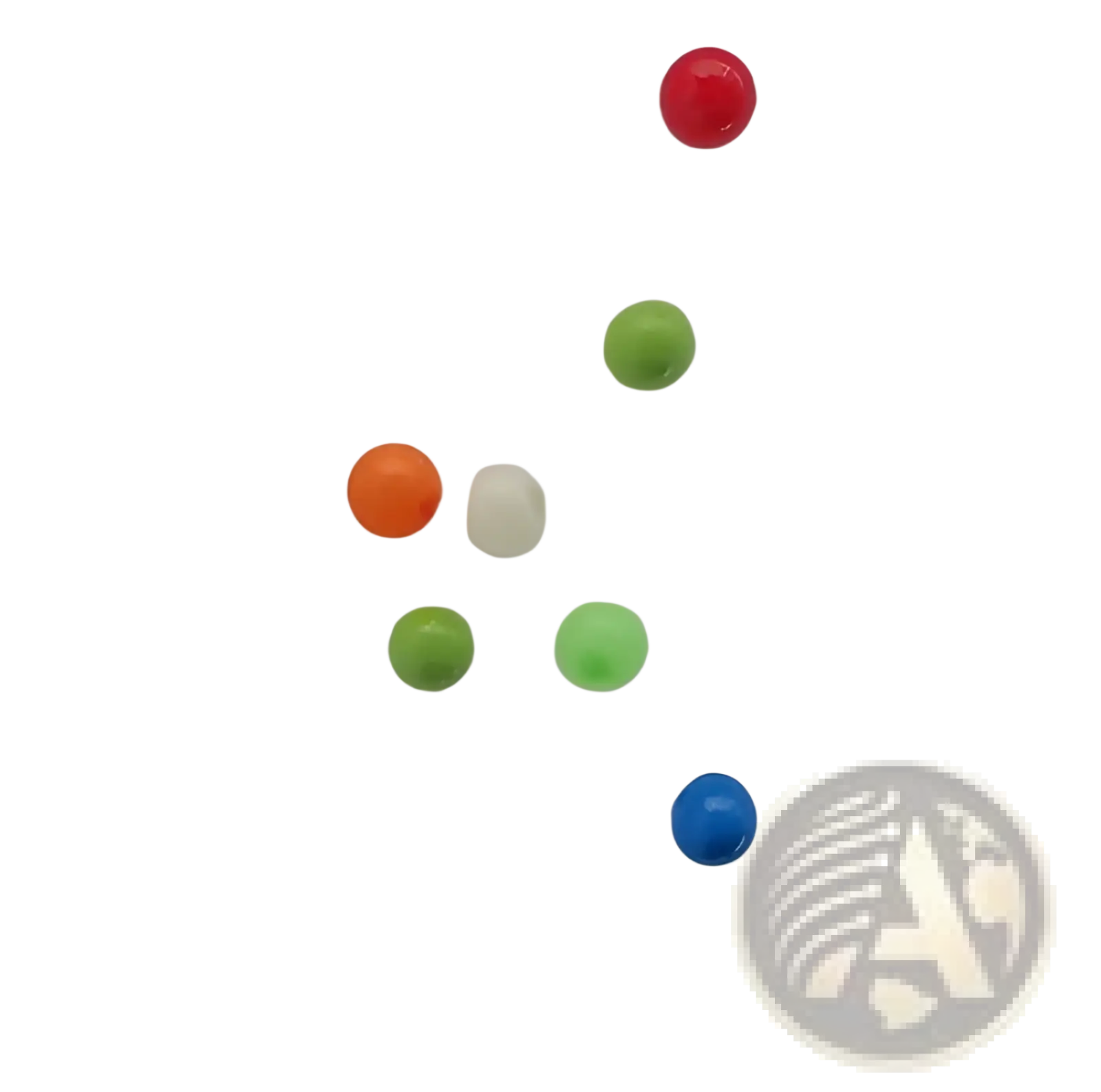 A collection of colorful glossy plastic beads in red orange green white and blue for sticky wall ball stress relief toys
