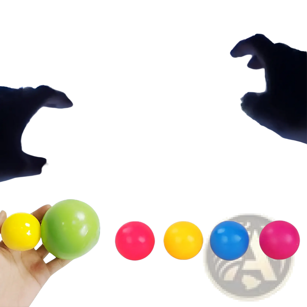 Brightly colored glossy sticky wall ball stress relief glow squash toys in yellow green pink and blue for sensory play