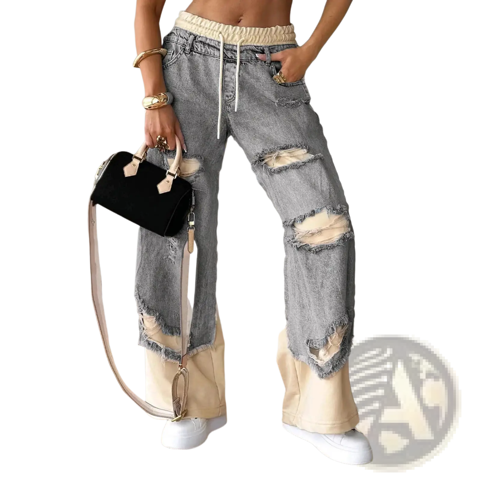Stitched contrast denim streetwear jeans in distressed light-wash denim with ripped knees and cream elastic waistband