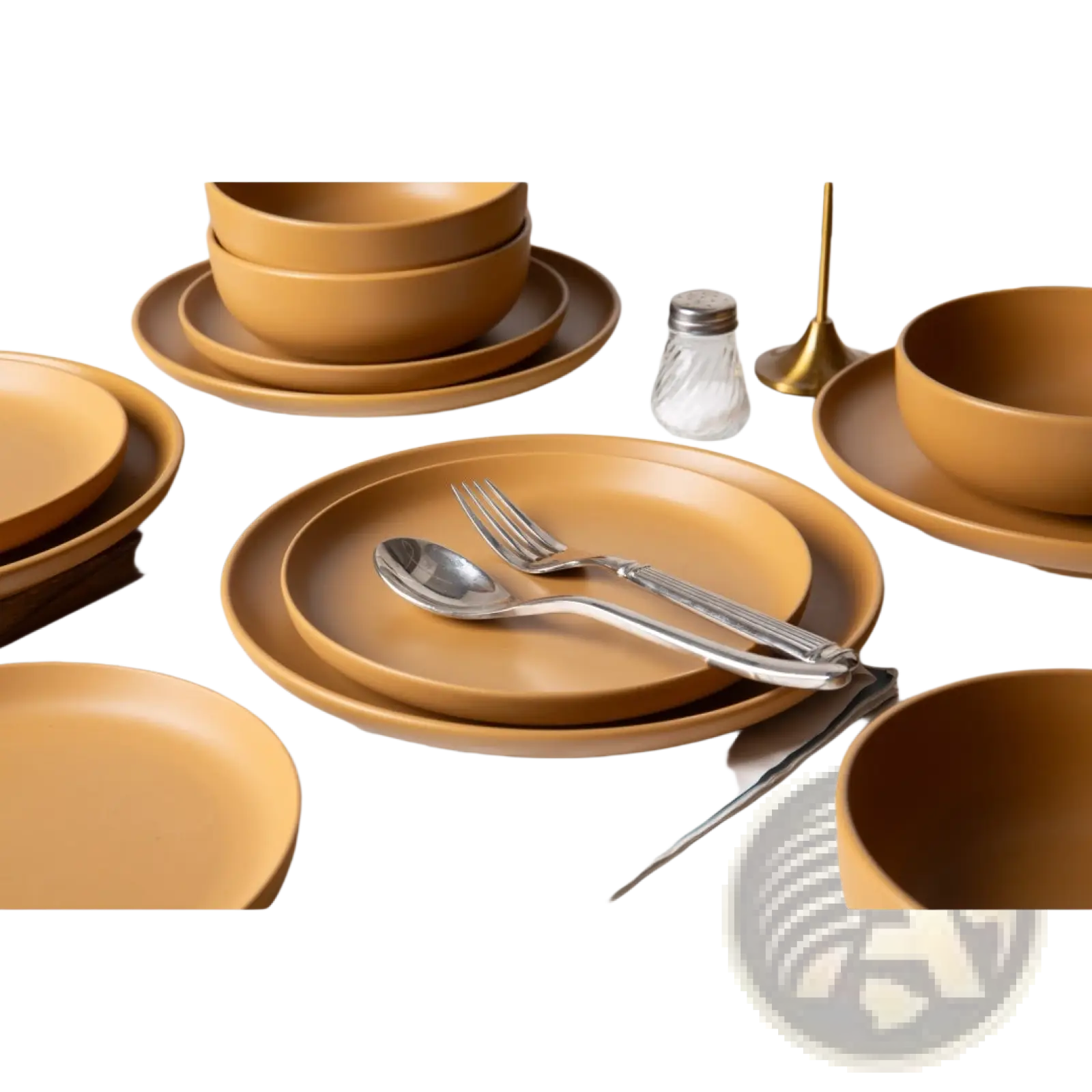 Set of 12 piece matte glaze mustard-yellow stoneware dinnerware with matching bowls and plates for three people