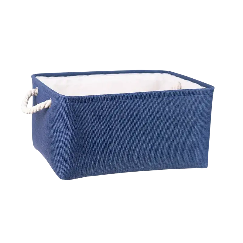 Blue woven fabric storage basket with white rope handles and cream interior lining for foldable storage baskets