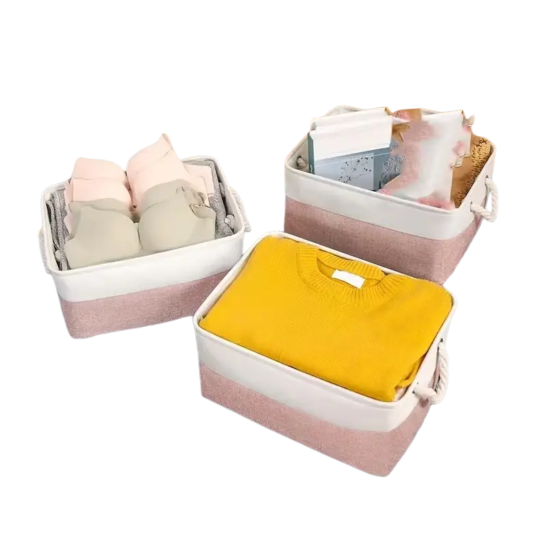 Pastel pink and white woven fabric storage baskets foldable bin with rope handles for organized storage solutions