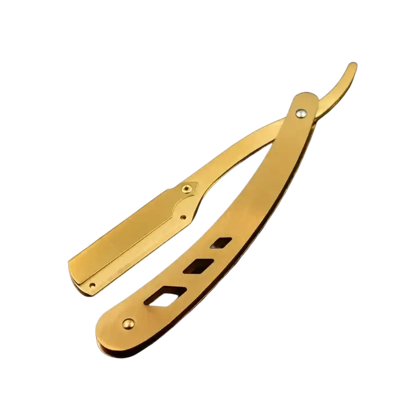 Gold-finished folding straight razor with metallic design and decorative handle cutouts for hair removal tool holder