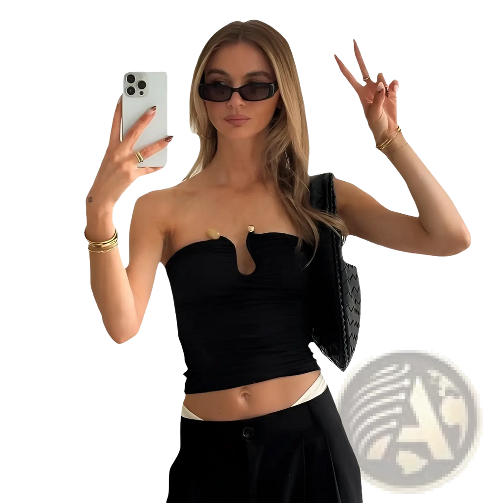 Black strapless keyhole crop top with gold-tone embellishments at the bust for stylish casual wear