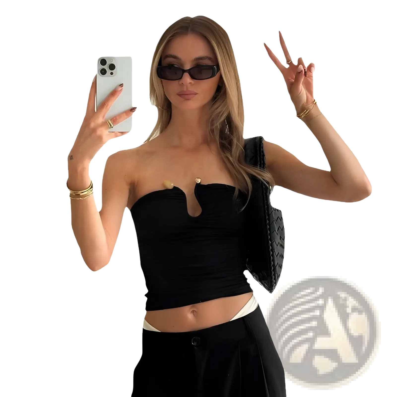 Black strapless keyhole crop top with gold-tone embellishments at the bust for stylish casual wear