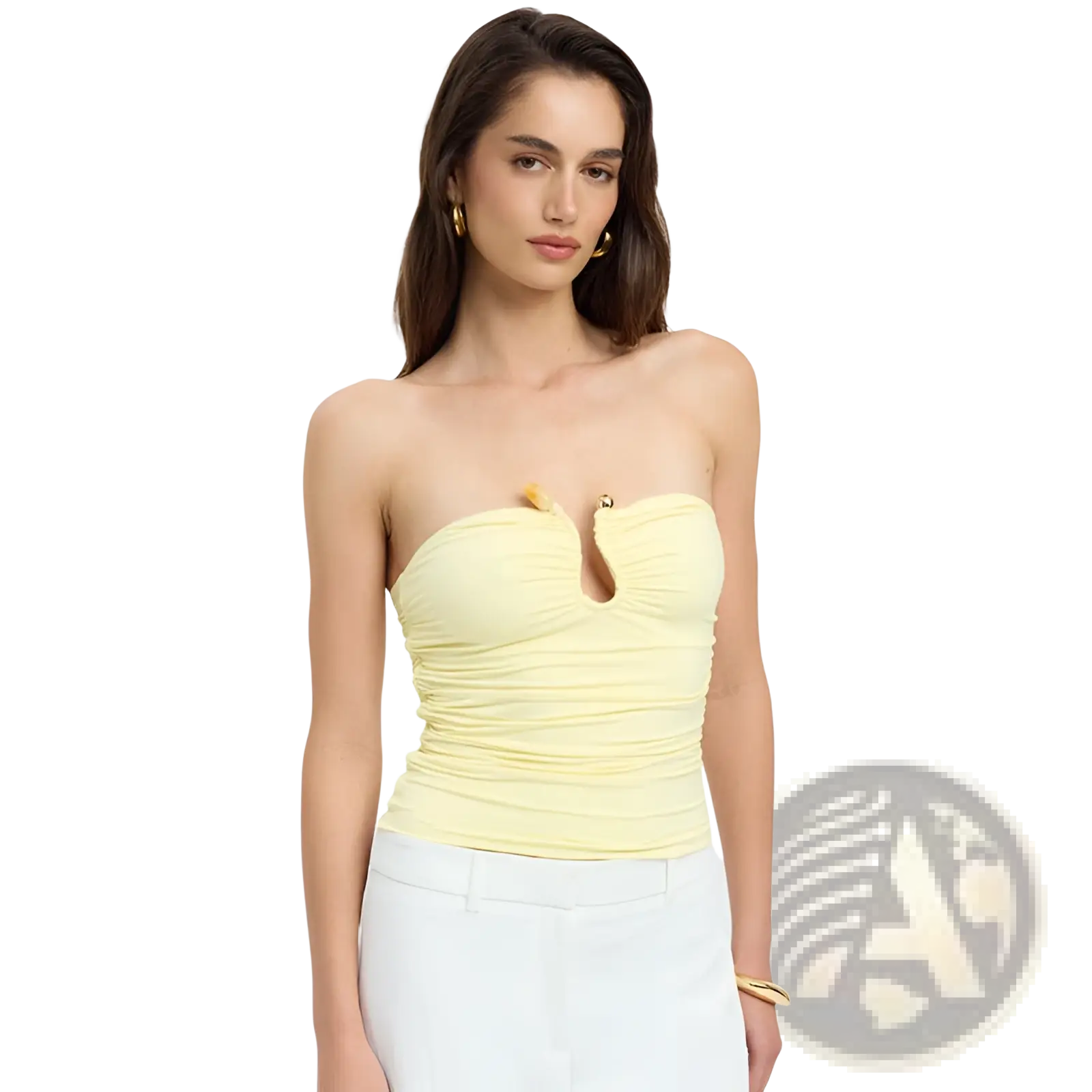 A pale yellow strapless keyhole crop top with ruched fabric and gold-tone hardware for stylish wear